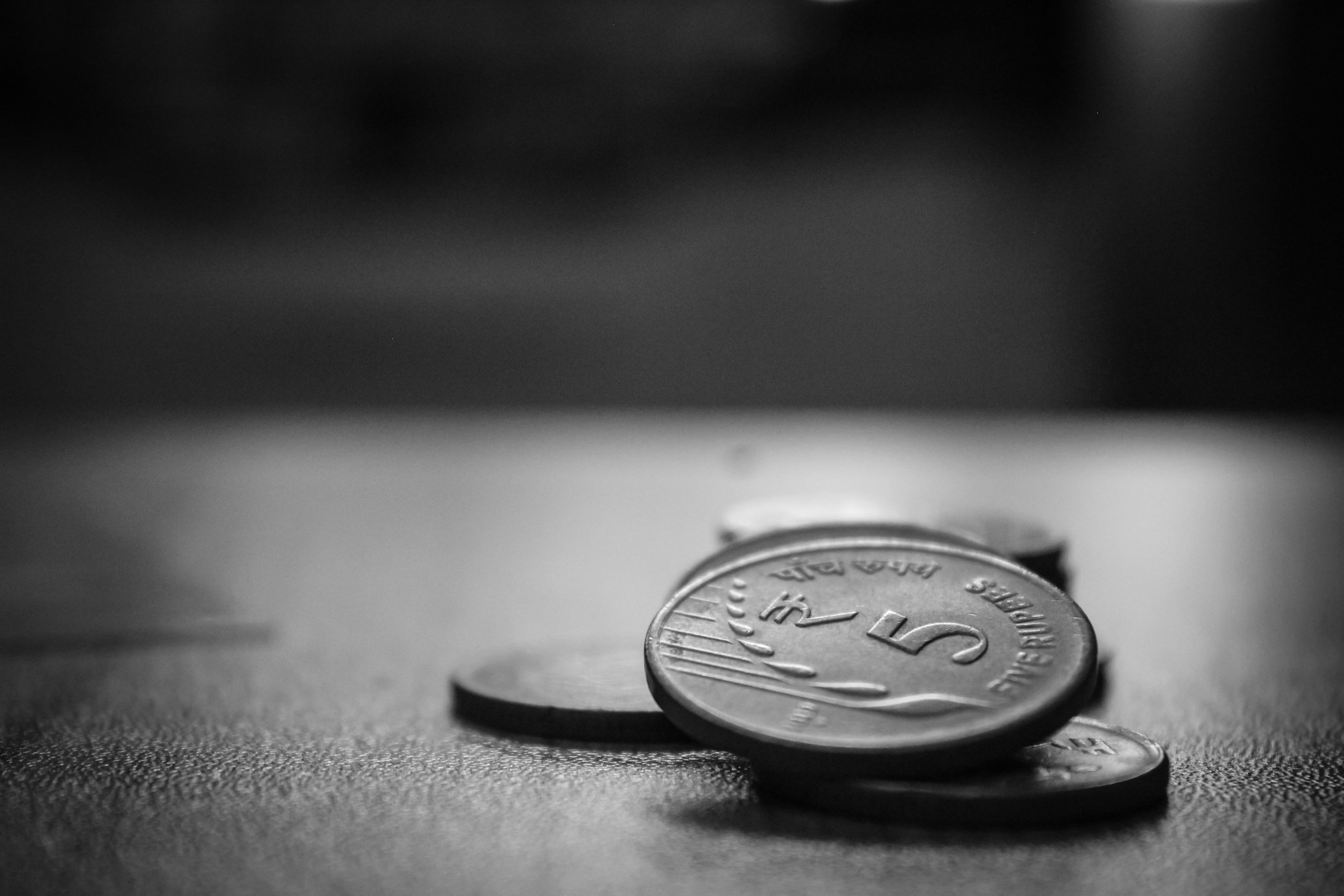 Grayscale Photo of Coins